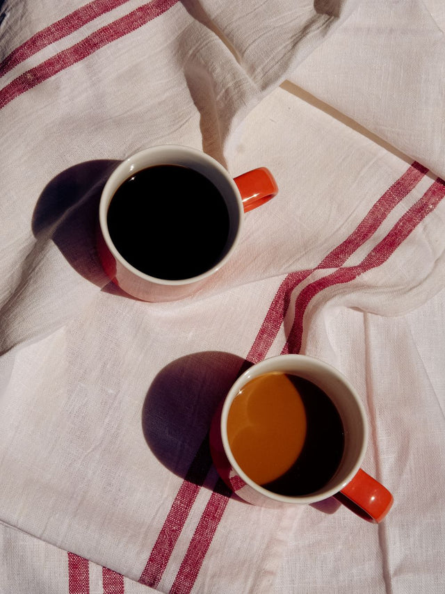 Two cups of Mesqi on a cloth